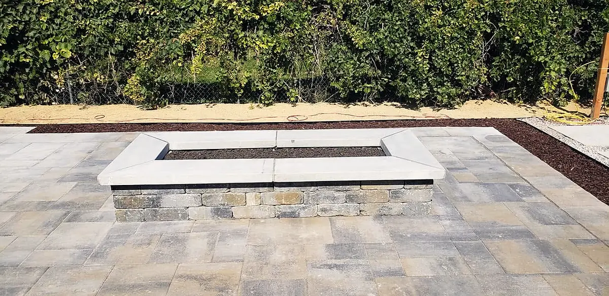Linear fire table on a large-format paver patio