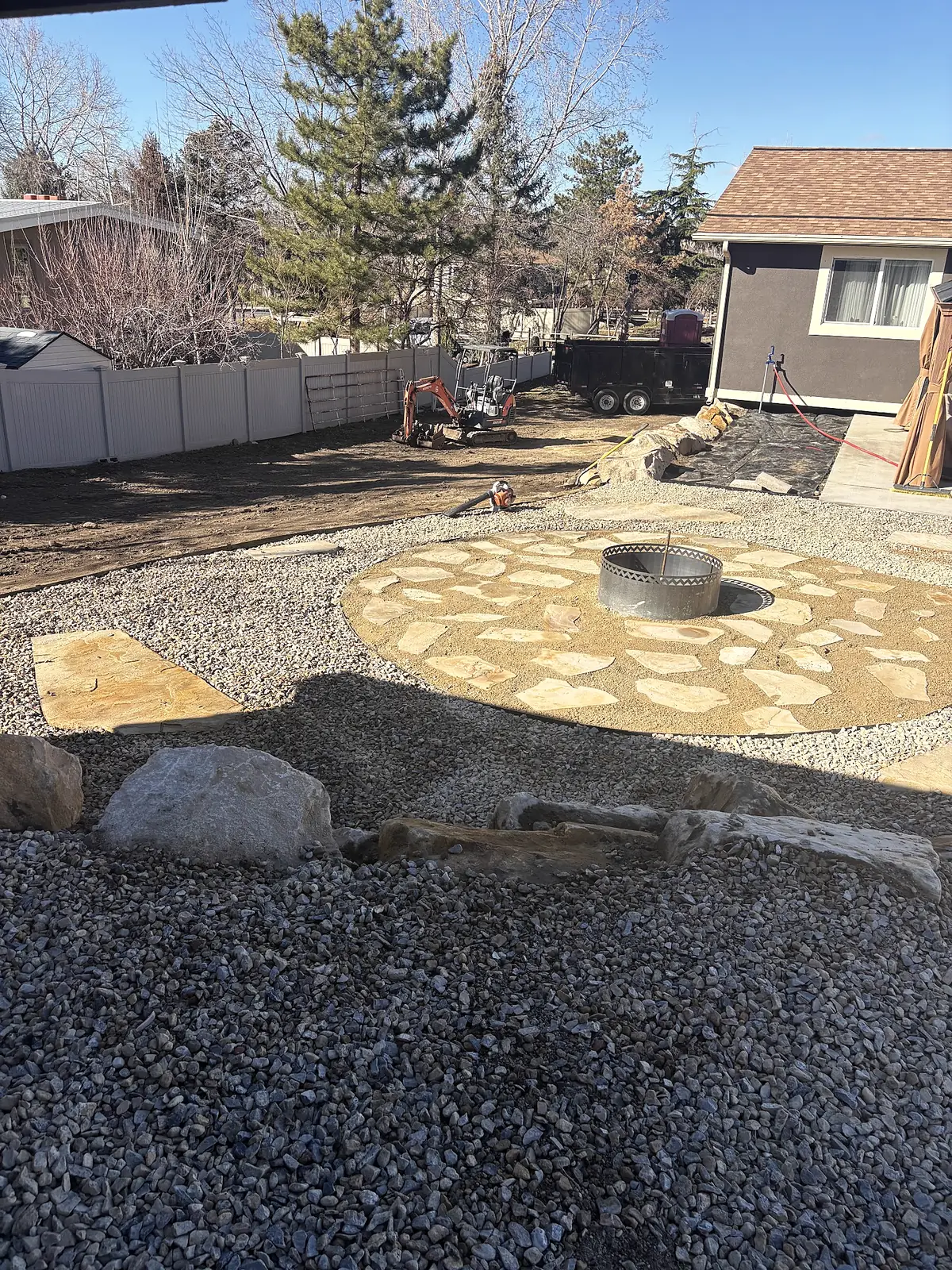 Custom fire pit on a flagstone patio
