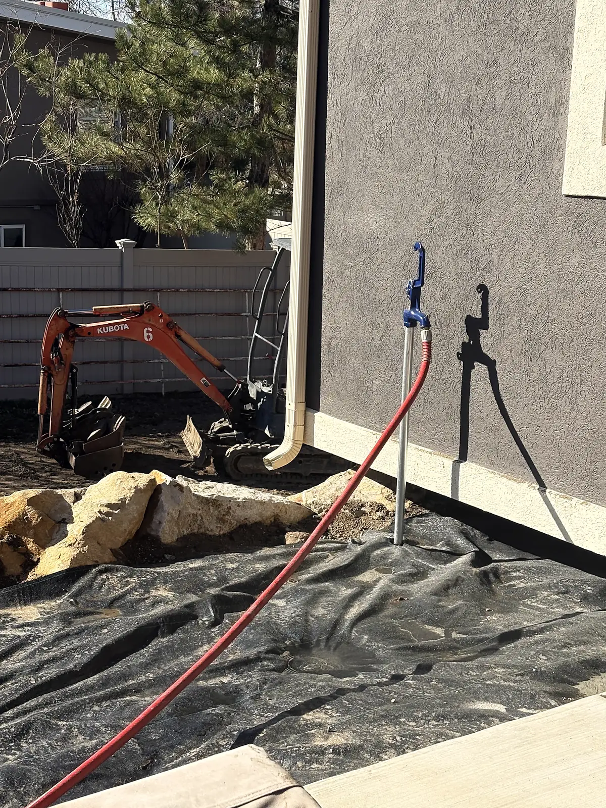 Prepping beds along the house