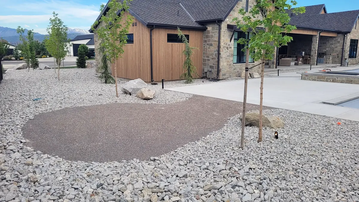 Rock yard with a gravel pad and boulders