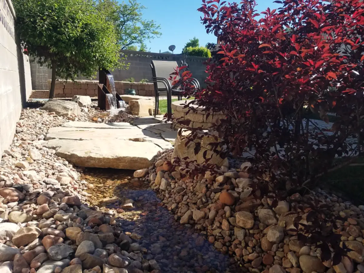 Stream bed with a flagstone bridge