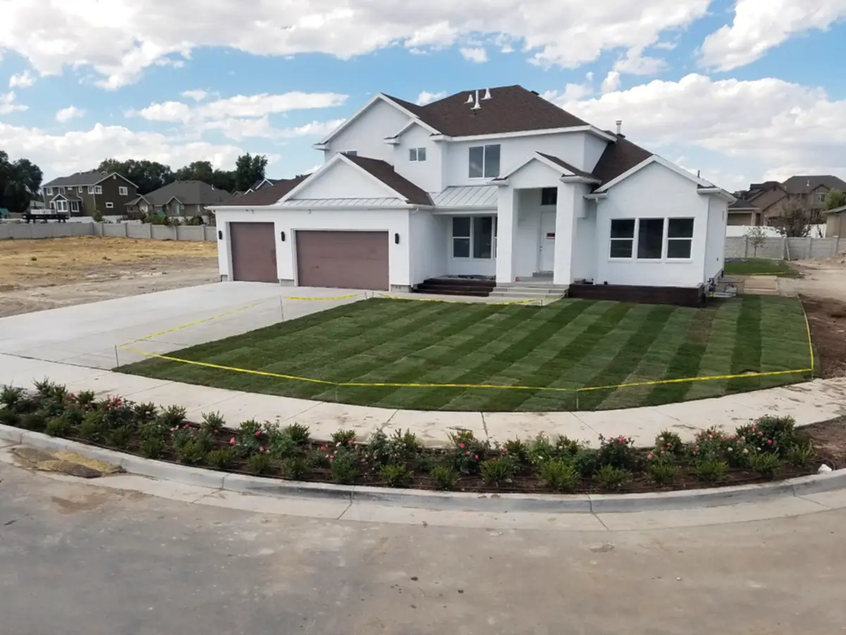 New-build front yard, sod and beds