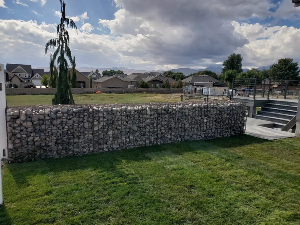 Gabion wall along a new lawn