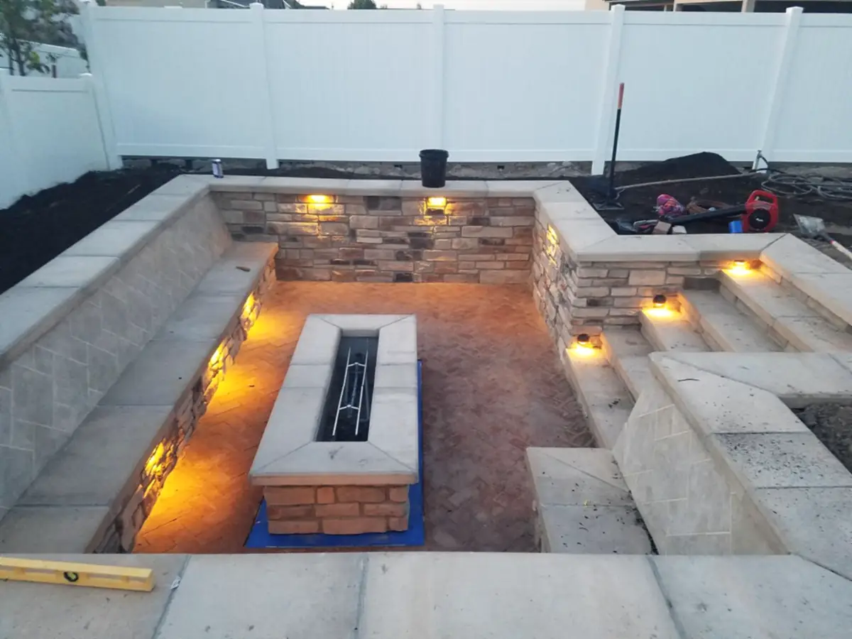 Fire lounge seat walls and gas fire trough
